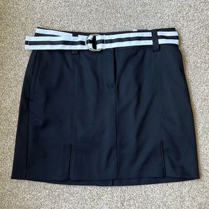 NWT Womens golf skort with matching belt. Size 6.